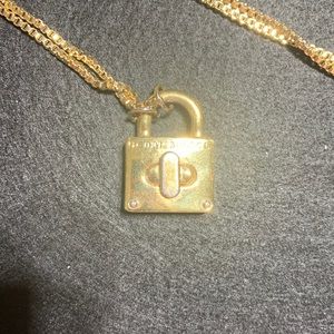 Necklace designed by HENRI BENDEL, rose gold coloring 16 inch drop great accent